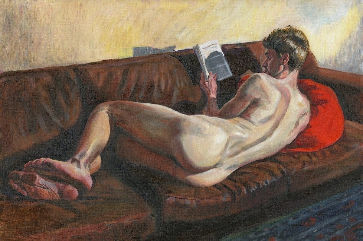 Oil painting by Evan Oberholster of a nude man reclining on a brown couch, reading a book